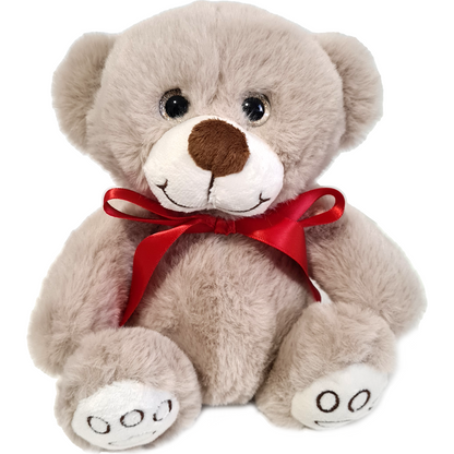 Plush light brown teddy bear with brown nose and red satin bow around neck